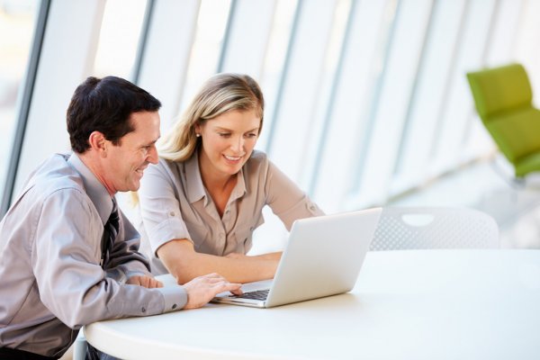 depositphotos_24647225-stock-photo-business-having-meeting-around-table
